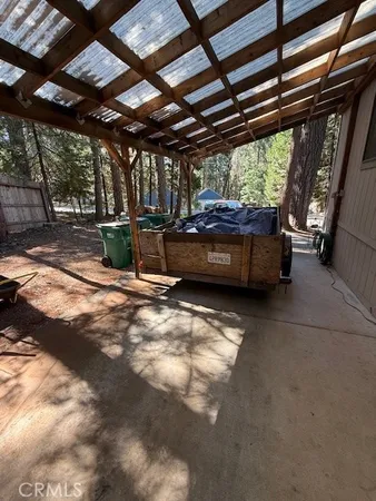 a kitchen with a stove a sink and a refrigerator