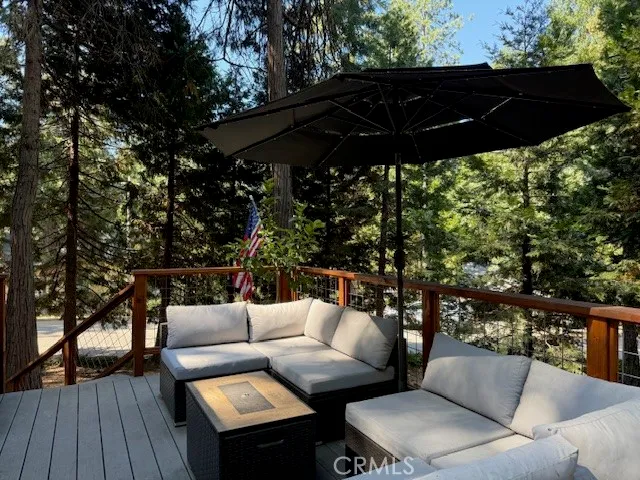 a view of a living room with a wooden floor