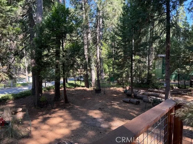 a kitchen with sink a window and cabinets