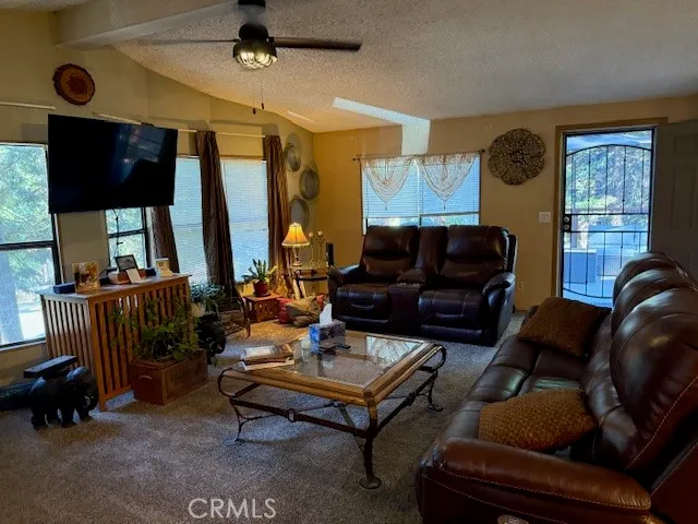 a bedroom with a bed and a lamp