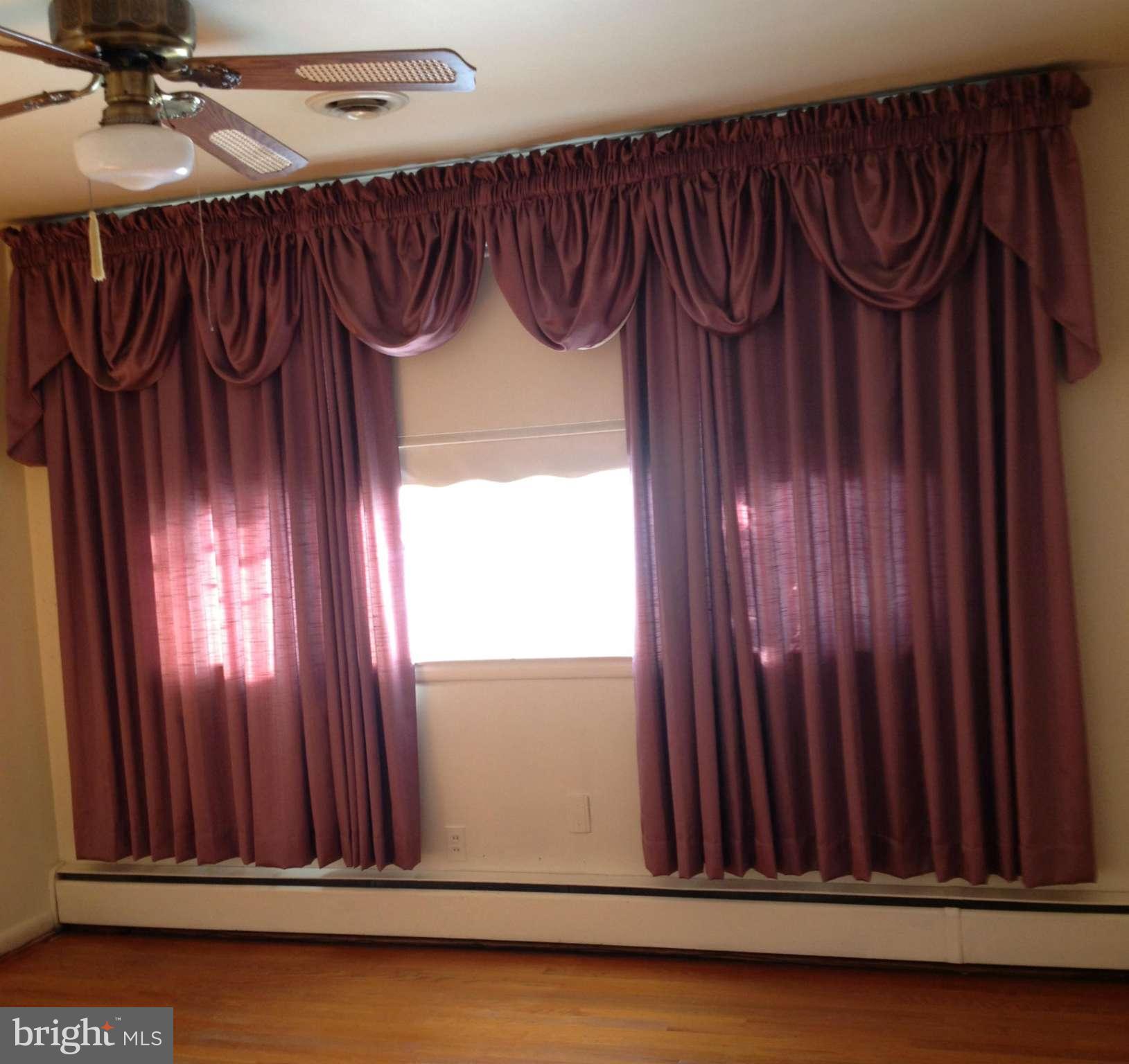 3312 Croydon Road Baltimore, MD 21207 - Photo 13 of 22 a view of a door with wooden floor