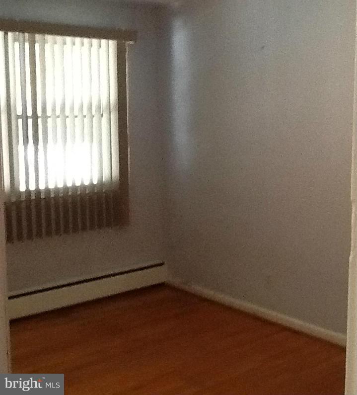 3312 Croydon Road Baltimore, MD 21207 - Photo 14 of 22 an empty room with a empty space and window