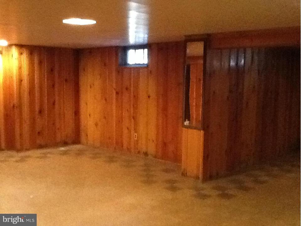 3312 Croydon Road Baltimore, MD 21207 - Photo 18 of 22 an empty room with wooden floor