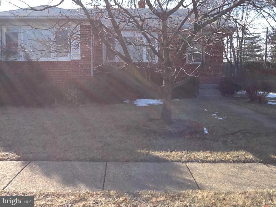 3312 Croydon Road Baltimore, MD 21207 - Photo 3 of 22 a view of a yard with a tree