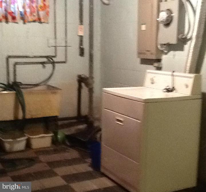3312 Croydon Road Baltimore, MD 21207 - Photo 21 of 22 a bathroom with a sink and a mirror