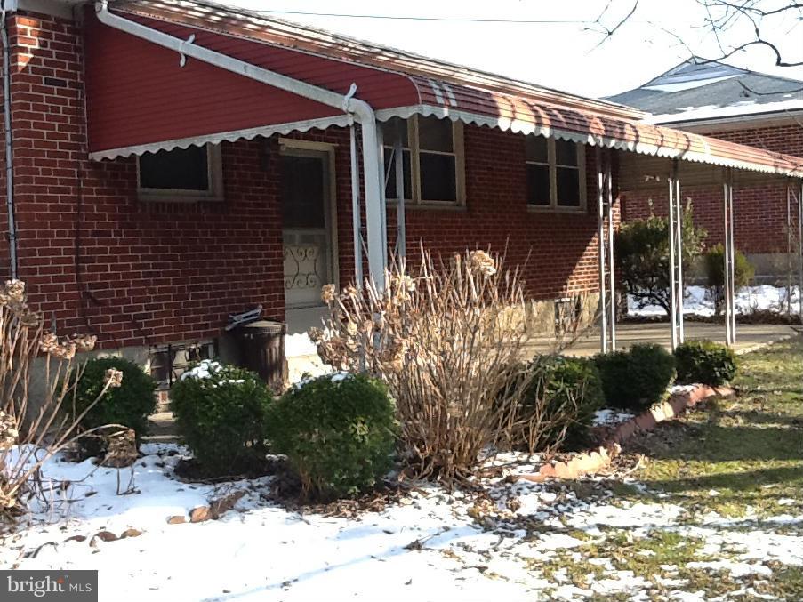 3312 Croydon Road Baltimore, MD 21207 - Photo 5 of 22 a view of a house with a yard