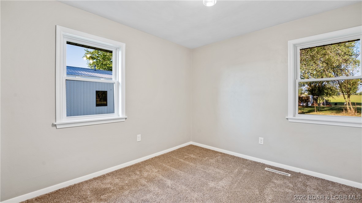 50 Hwy Y Eldon, MO 65026 - Photo 21 of 43 Bedroom 1 of 3 has windows on both side and front