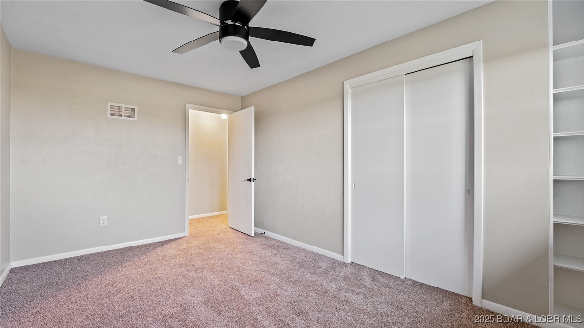 50 Hwy Y Eldon, MO 65026 - Photo 26 of 43 Bedroom 2 of 3 complete with built in shelves.