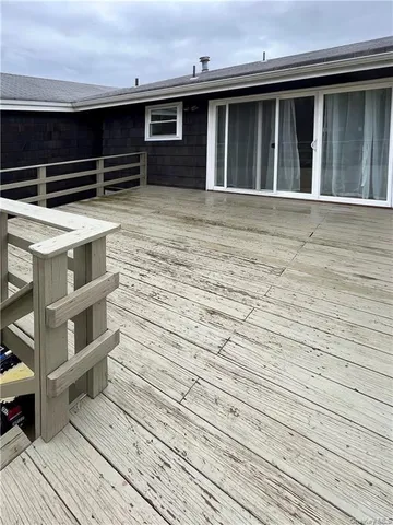 a view of a house with a large window