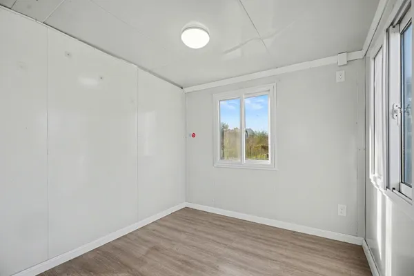 a bathroom with a toilet sink shower and mirror