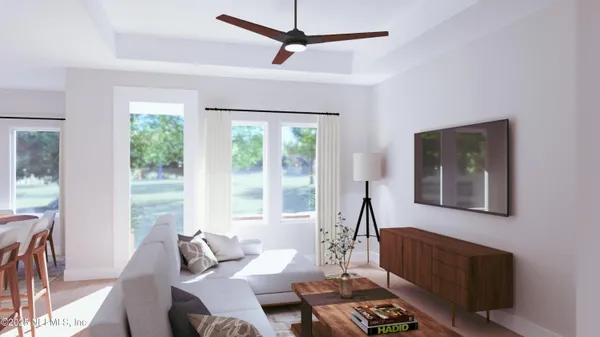 a living room with furniture and a window