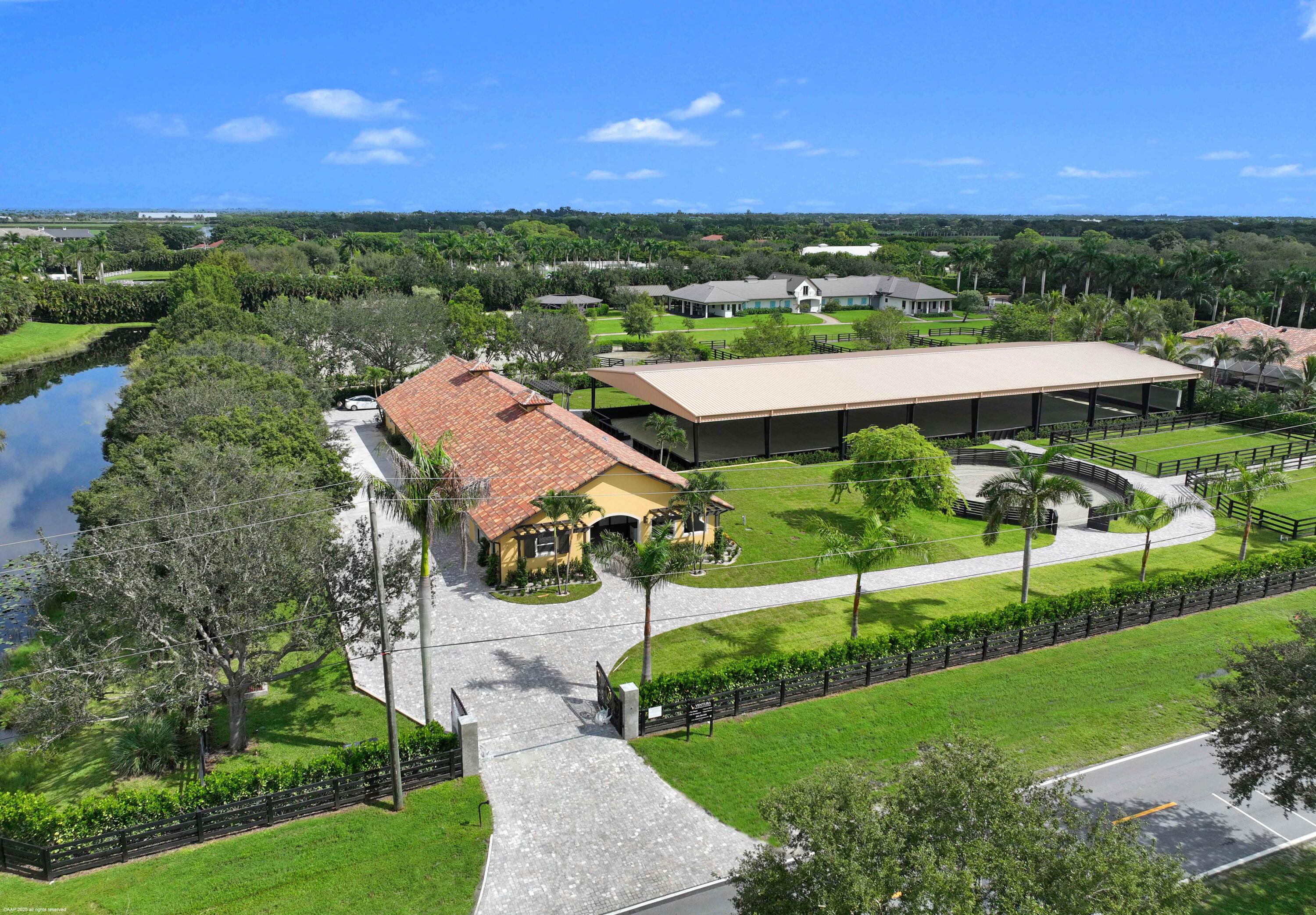4985 Stables Way Wellington, FL 33414 - Photo 4 of 79 a view of a city