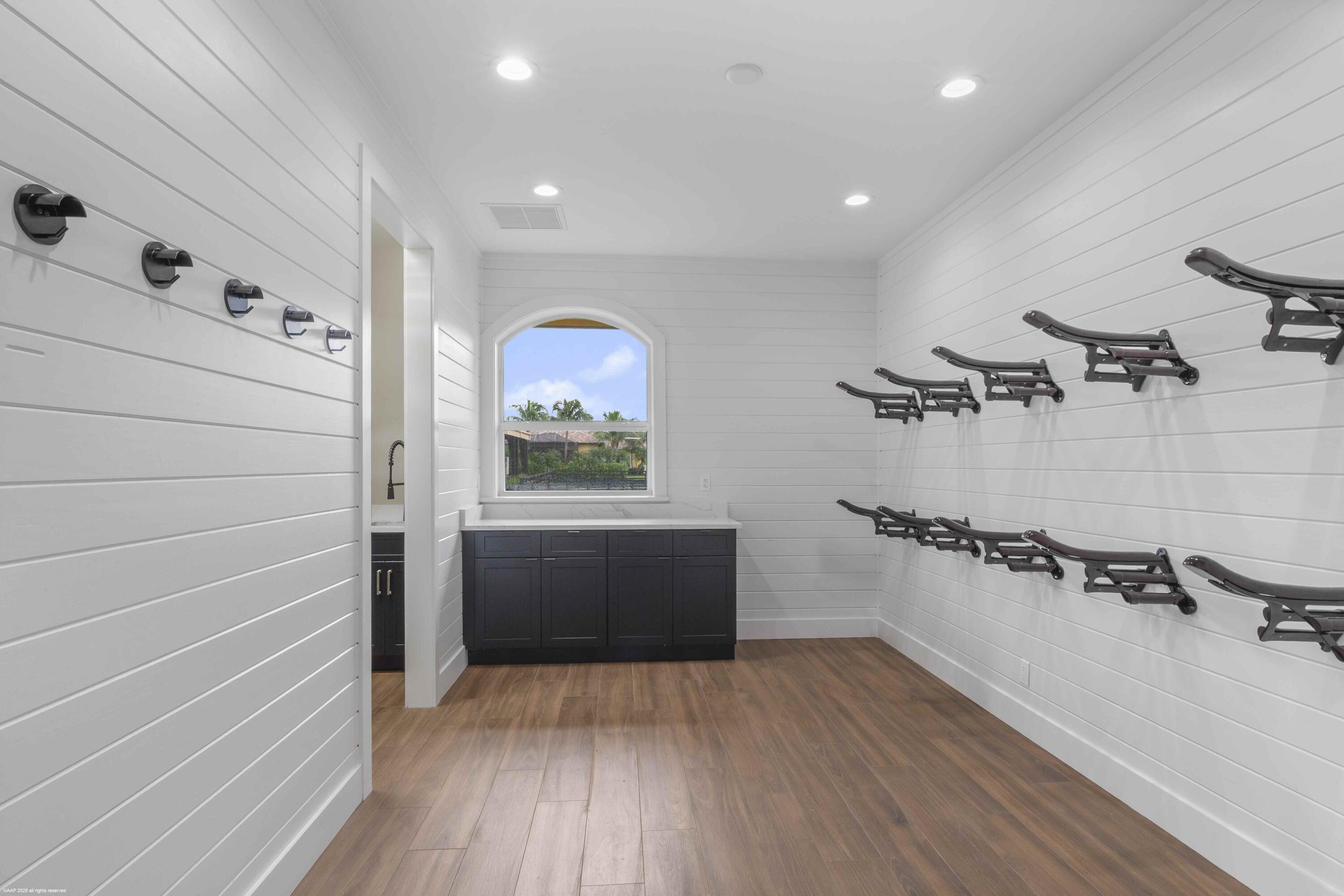 4985 Stables Way Wellington, FL 33414 - Photo 45 of 79 a view of a walk in closet