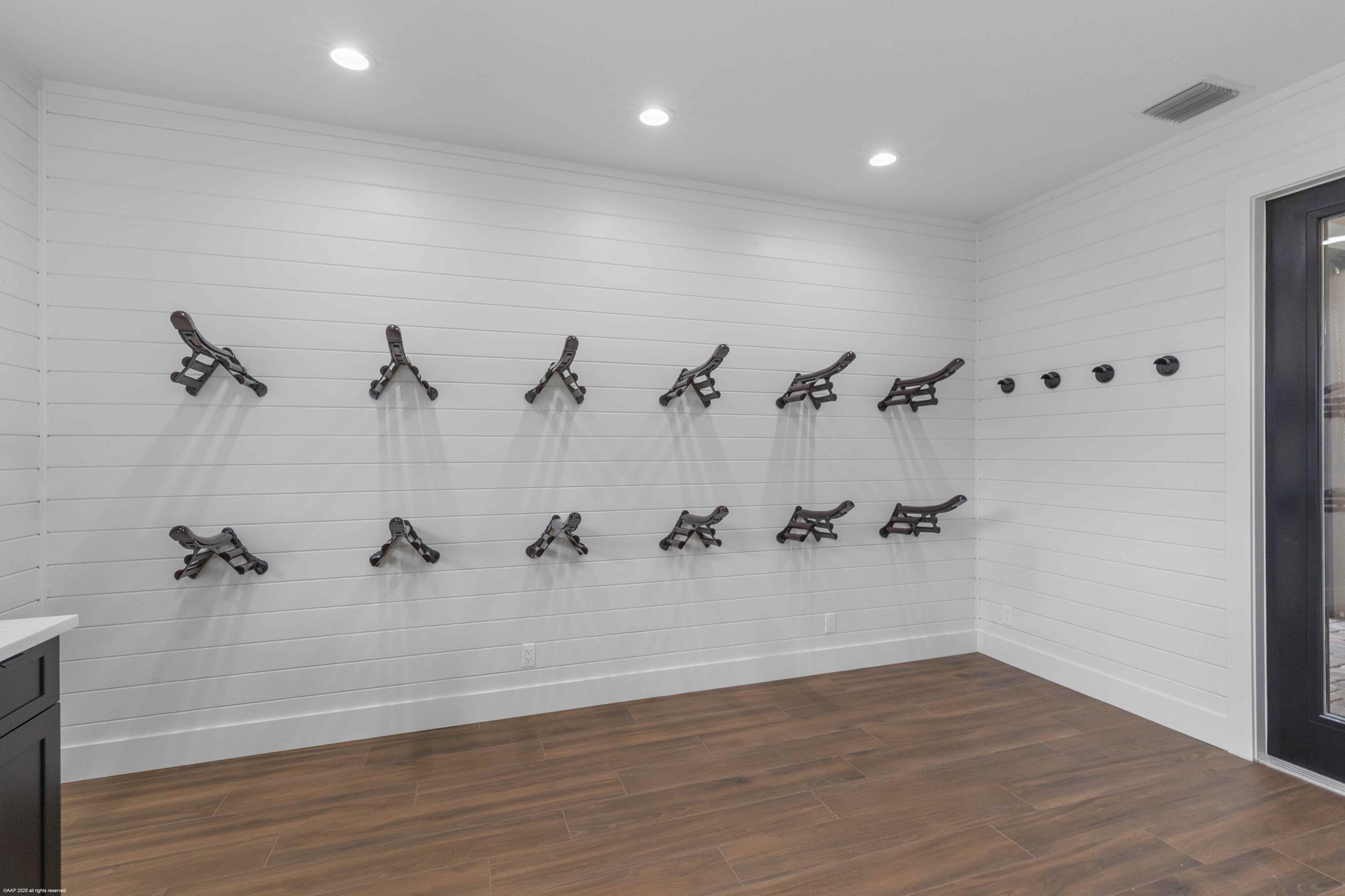 4985 Stables Way Wellington, FL 33414 - Photo 48 of 79 wooden floor in a bathroom