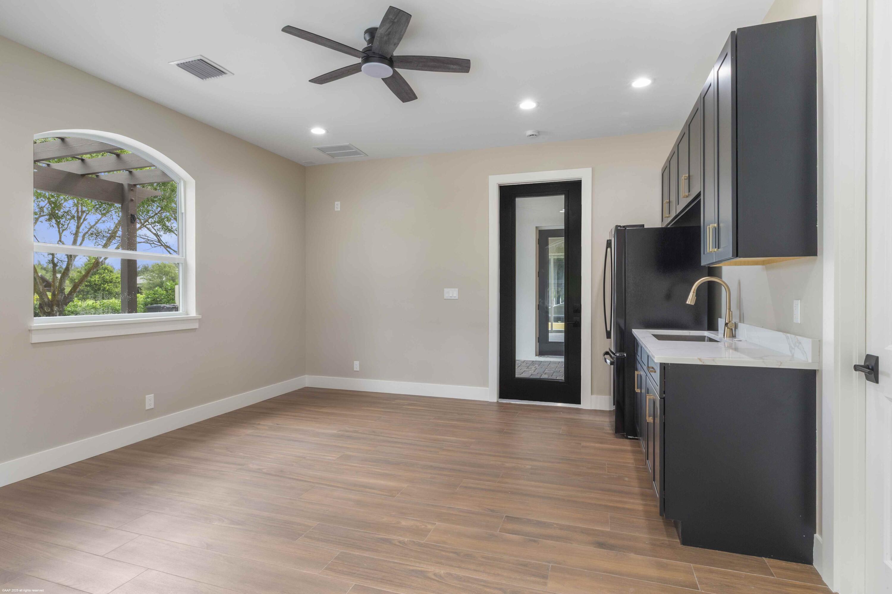 4985 Stables Way Wellington, FL 33414 - Photo 53 of 79 a view of a kitchen with a sink and a window
