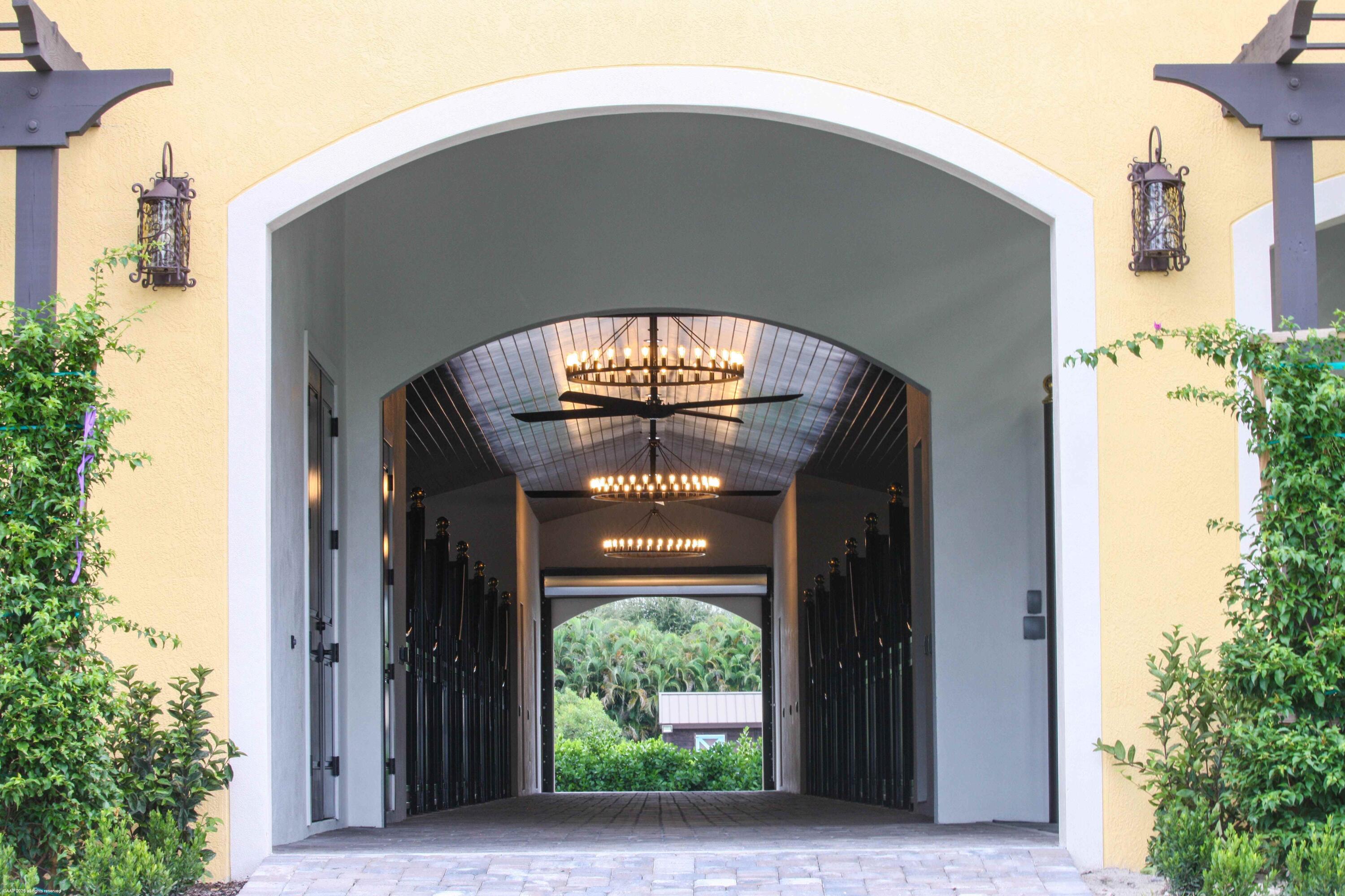 4985 Stables Way Wellington, FL 33414 - Photo 9 of 79 a view of a front door of the house