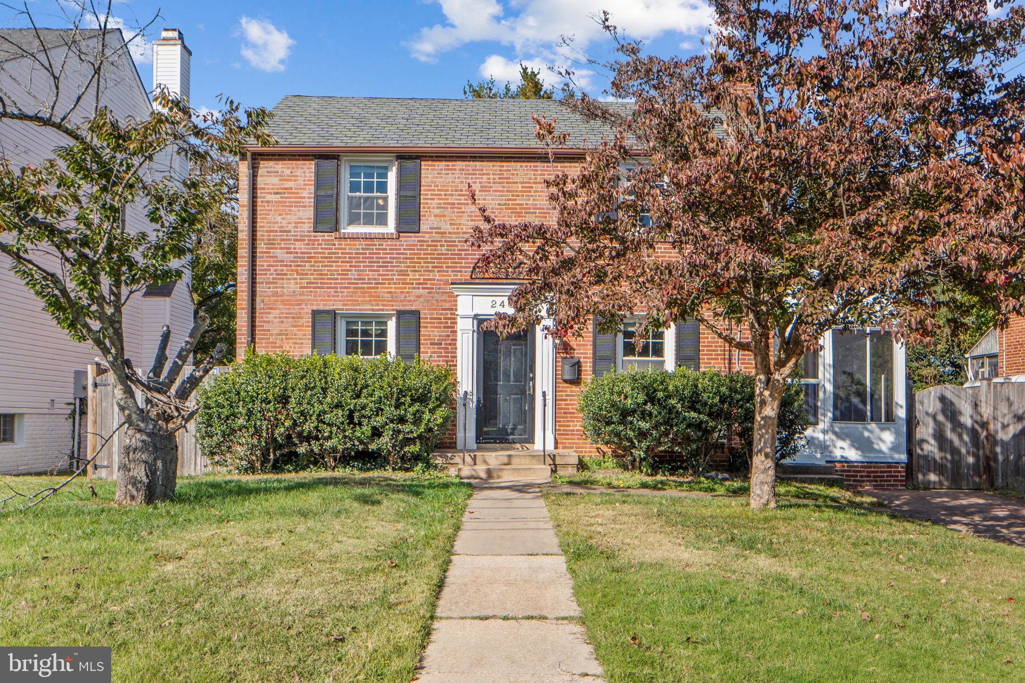 2405 Homestead Drive Silver Spring, MD 20902 - Photo 1 of 43 a front view of a house with garden