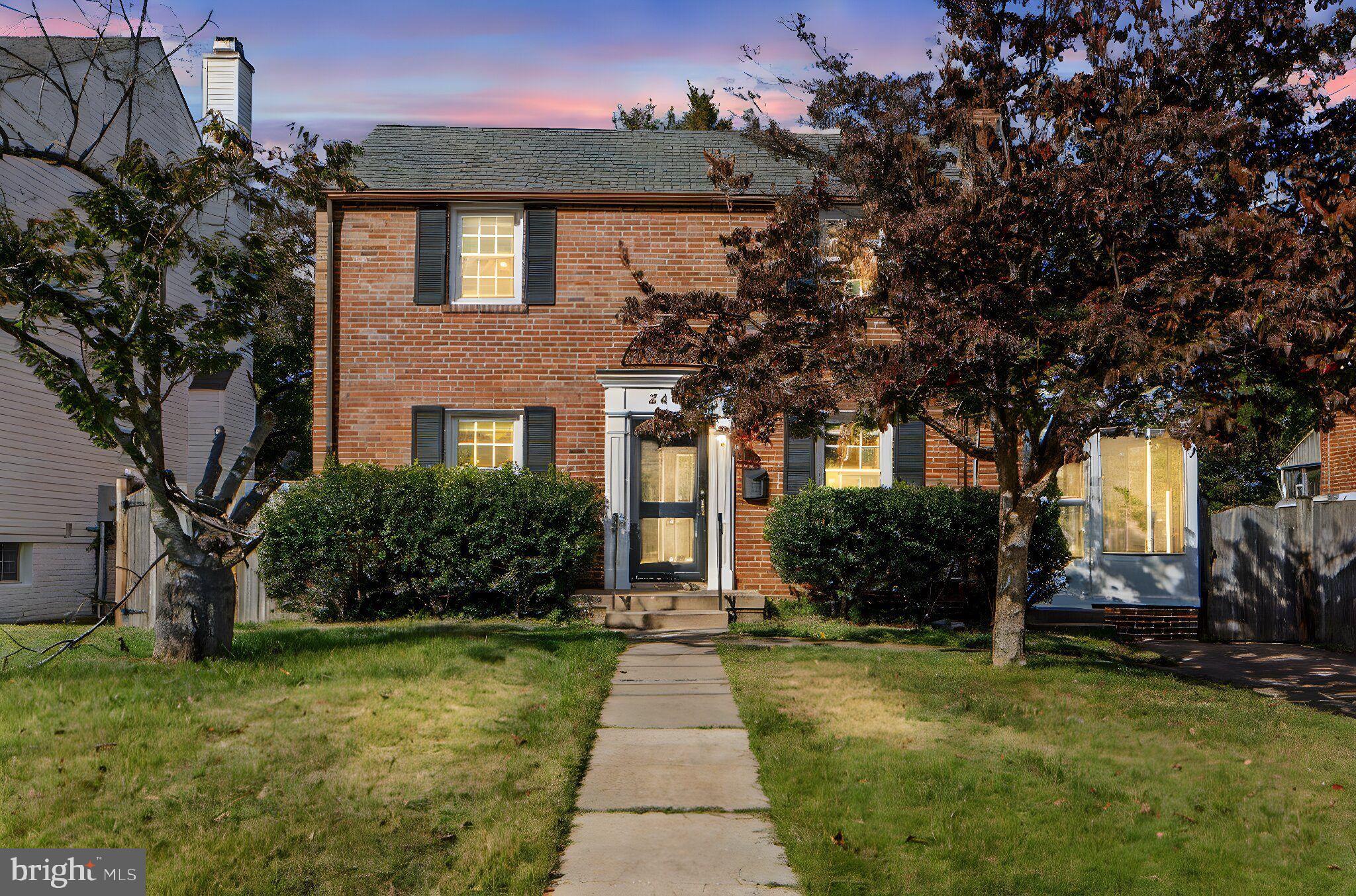 2405 Homestead Drive Silver Spring, MD 20902 - Photo 2 of 43 a front view of a house with garden