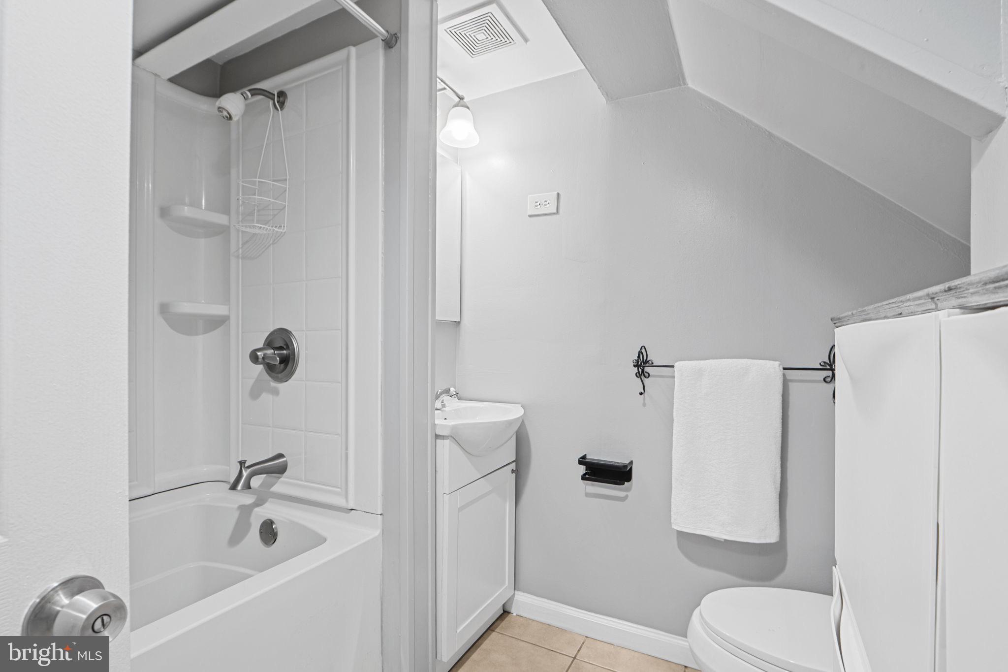 2405 Homestead Drive Silver Spring, MD 20902 - Photo 32 of 43 a bathroom with a shower and a toilet