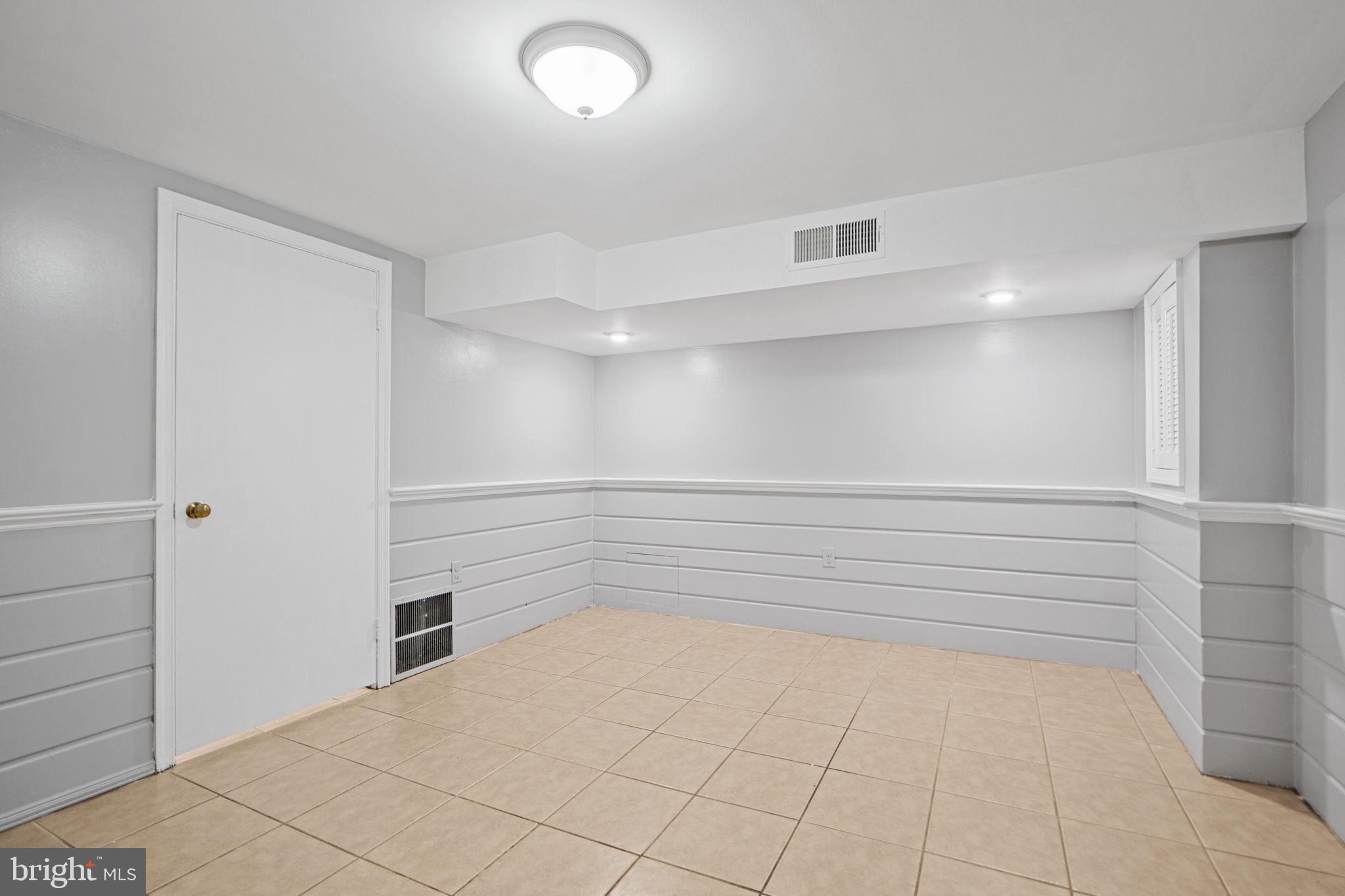 2405 Homestead Drive Silver Spring, MD 20902 - Photo 33 of 43 a view of an empty walk in closet