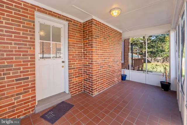 a swimming pool with wooden fence