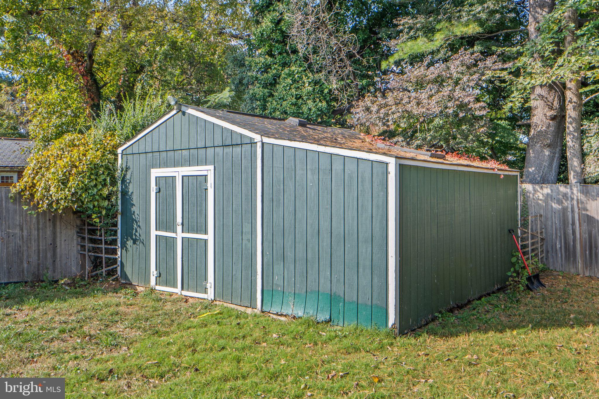 2405 Homestead Drive Silver Spring, MD 20902 - Photo 38 of 43 a house with trees in the background