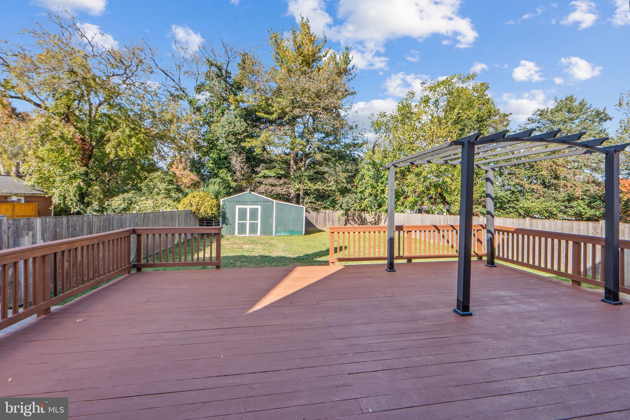 2405 Homestead Drive Silver Spring, MD 20902 - Photo 42 of 43 a view of a deck with a yard