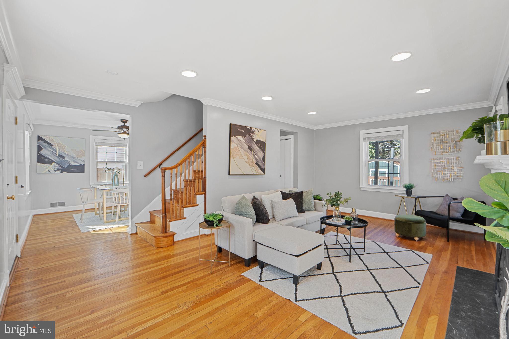 2405 Homestead Drive Silver Spring, MD 20902 - Photo 9 of 43 a living room with fireplace furniture and a wooden floor