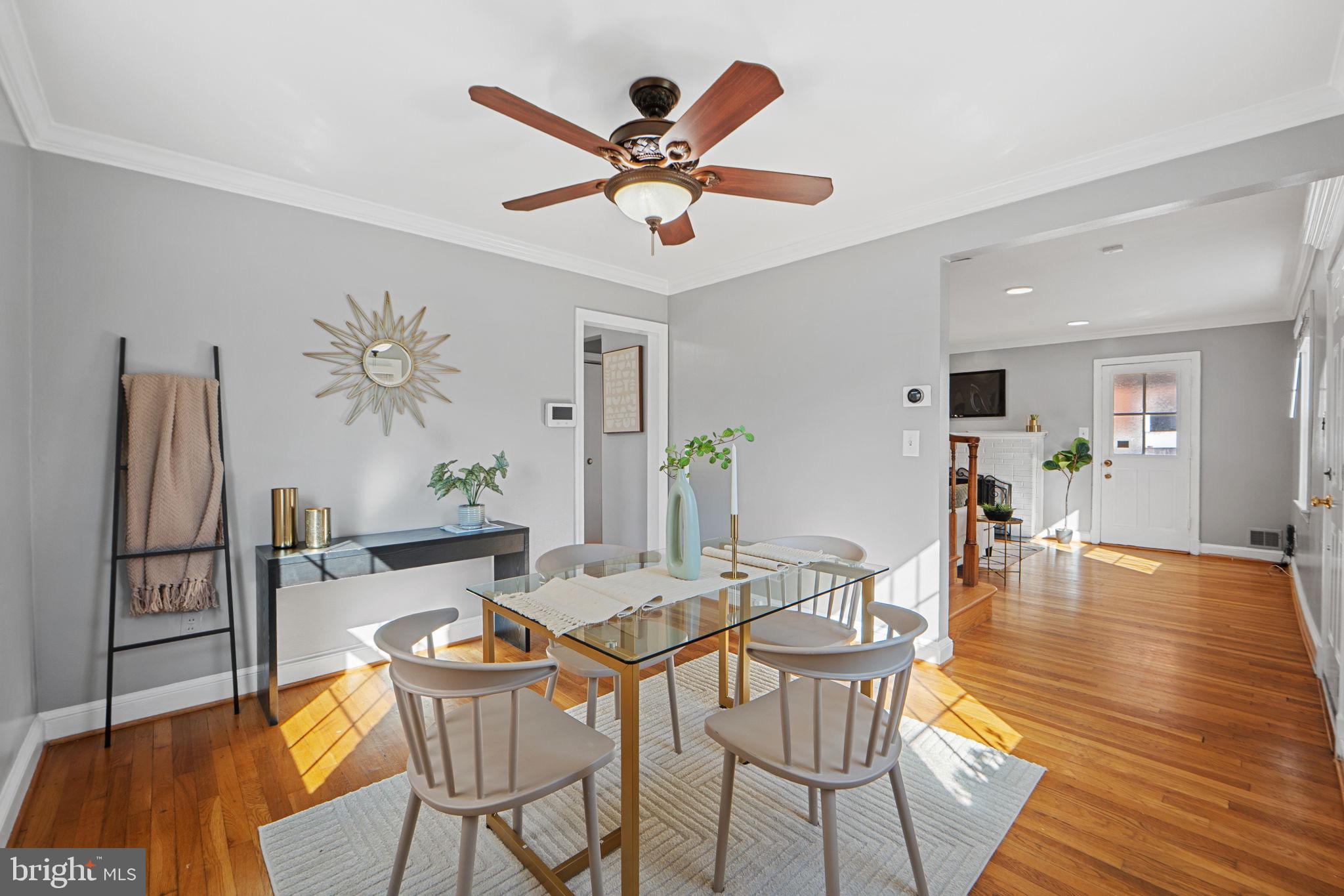 2405 Homestead Drive Silver Spring, MD 20902 - Photo 10 of 43 a view of a dining room with furniture and wooden floor