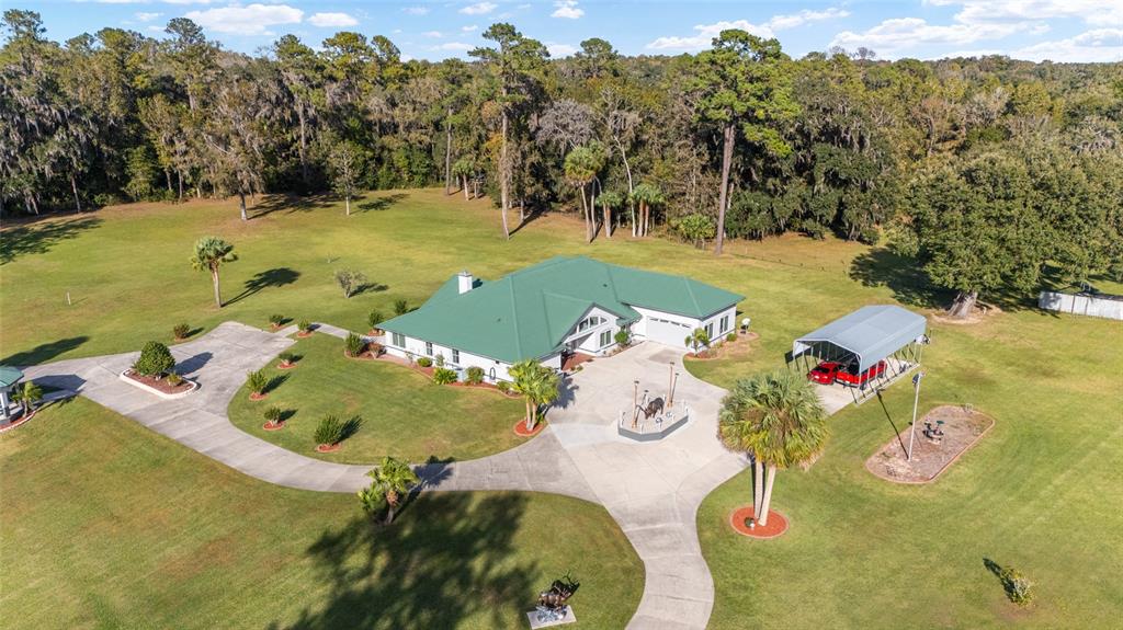 255 Southwest 96th Lane Ocala, FL 34476 - Photo 12 of 92 an aerial view of a swimming pool