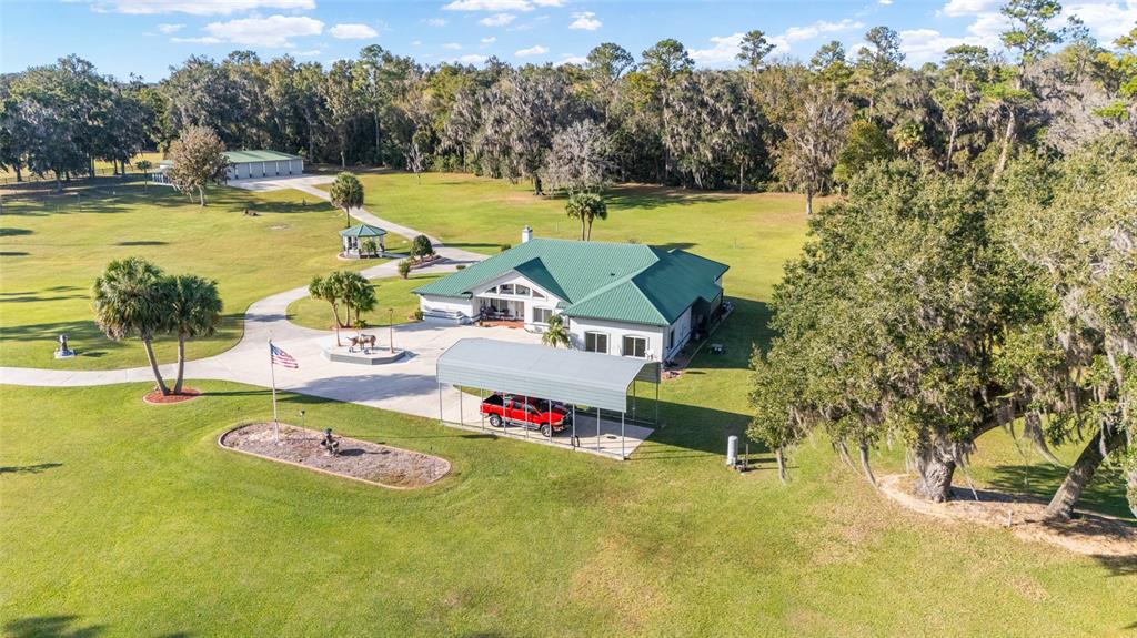 255 Southwest 96th Lane Ocala, FL 34476 - Photo 13 of 92 a view of a swimming pool with a patio