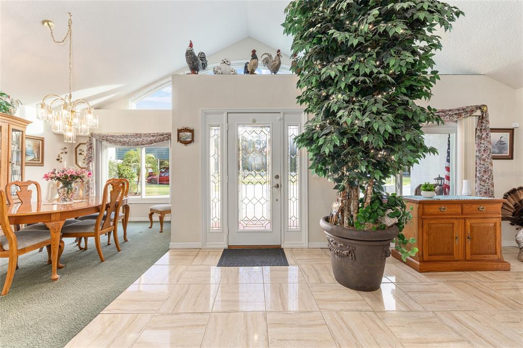 255 Southwest 96th Lane Ocala, FL 34476 - Photo 18 of 92 a view of a dining room with furniture window and wooden floor