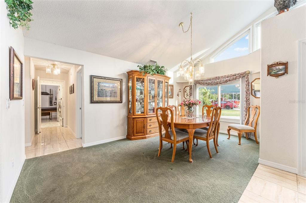 255 Southwest 96th Lane Ocala, FL 34476 - Photo 19 of 92 a dining room with furniture and window