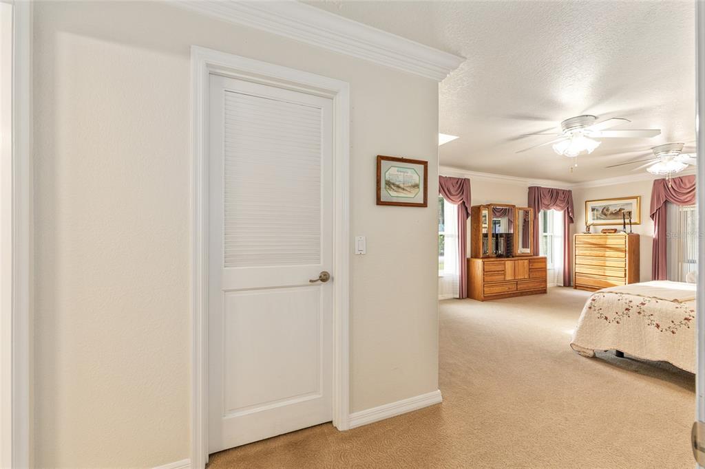255 Southwest 96th Lane Ocala, FL 34476 - Photo 23 of 87 a view of a bedroom with a furniture and closet