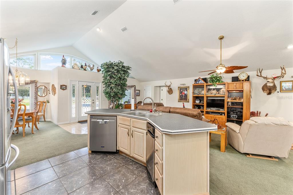 255 Southwest 96th Lane Ocala, FL 34476 - Photo 24 of 92 a kitchen with stainless steel appliances granite countertop a sink and cabinets
