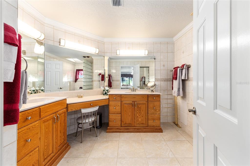 255 Southwest 96th Lane Ocala, FL 34476 - Photo 40 of 92 a large kitchen with stainless steel appliances granite countertop a sink and cabinets