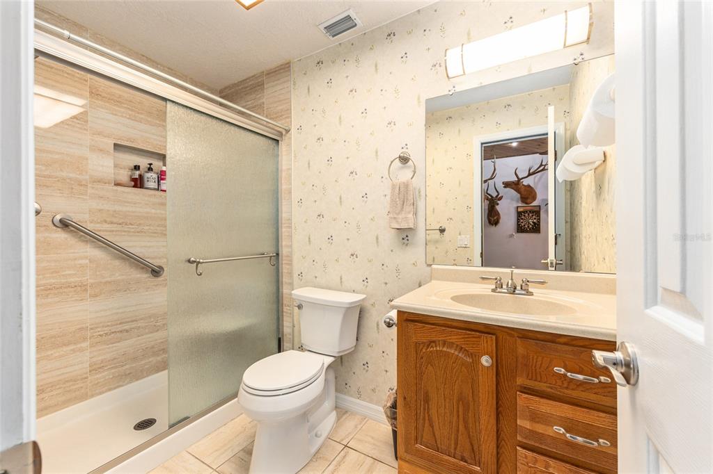 255 Southwest 96th Lane Ocala, FL 34476 - Photo 64 of 92 a bathroom with a sink toilet and shower