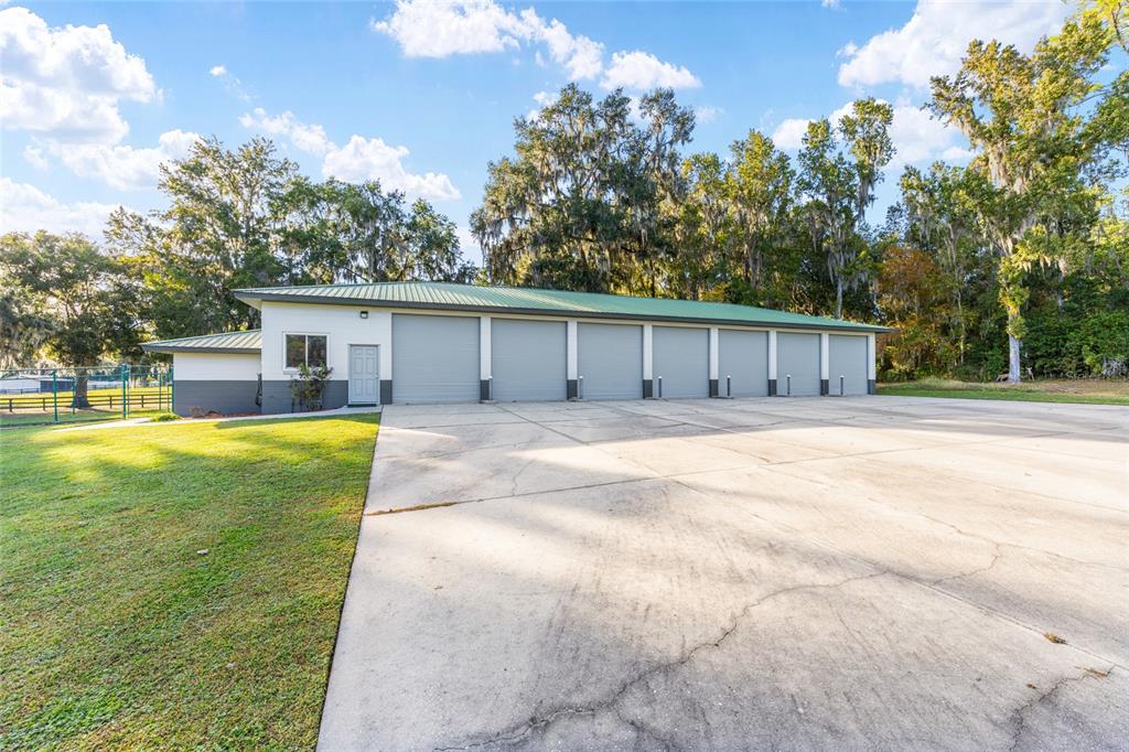 255 Southwest 96th Lane Ocala, FL 34476 - Photo 68 of 92 a view of a house with a backyard