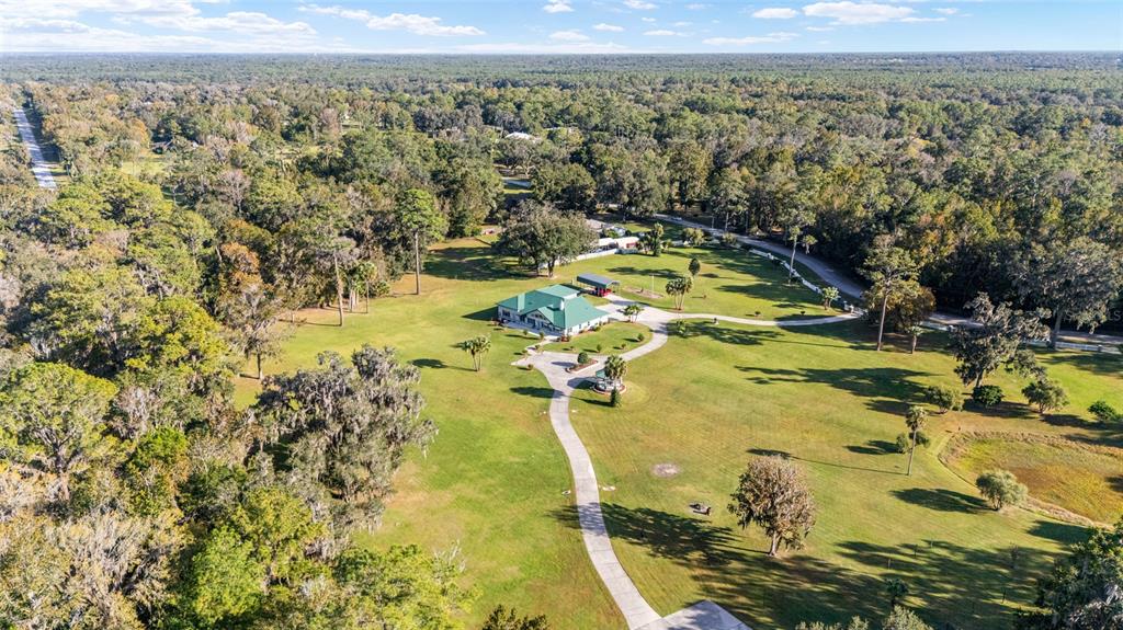 255 Southwest 96th Lane Ocala, FL 34476 - Photo 88 of 92 a view of a swimming pool with a mountain