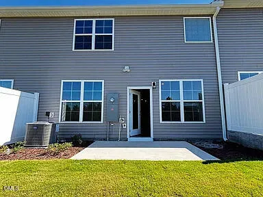 a front view of a house having yard