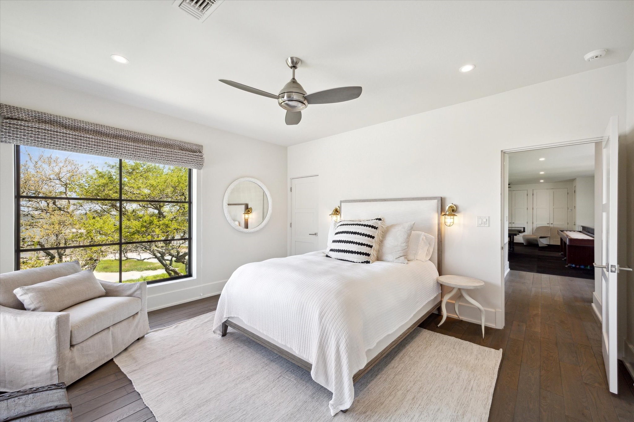633 Quintana Roo Place Seabrook, TX 77586 - Photo 26 of 47 Bedroom #2 can be accessed by elevator. It is located in the northern wing, near the game room. As with all the bedrooms, it has its own en suite bathroom and magnificent views.