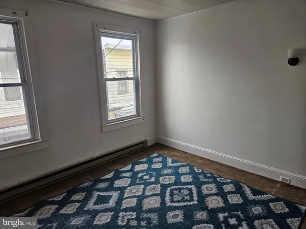 a view of a window in an empty room