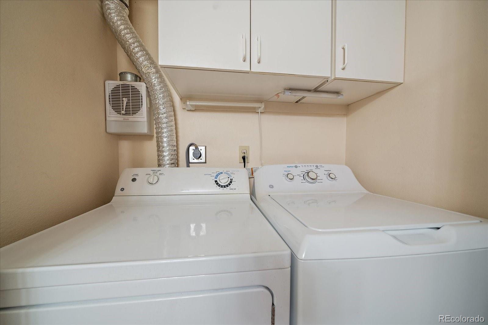471 South Kalispell Way, Unit 101 Aurora, CO 80017 - Photo 19 of 27 a utility room with dryer and washer