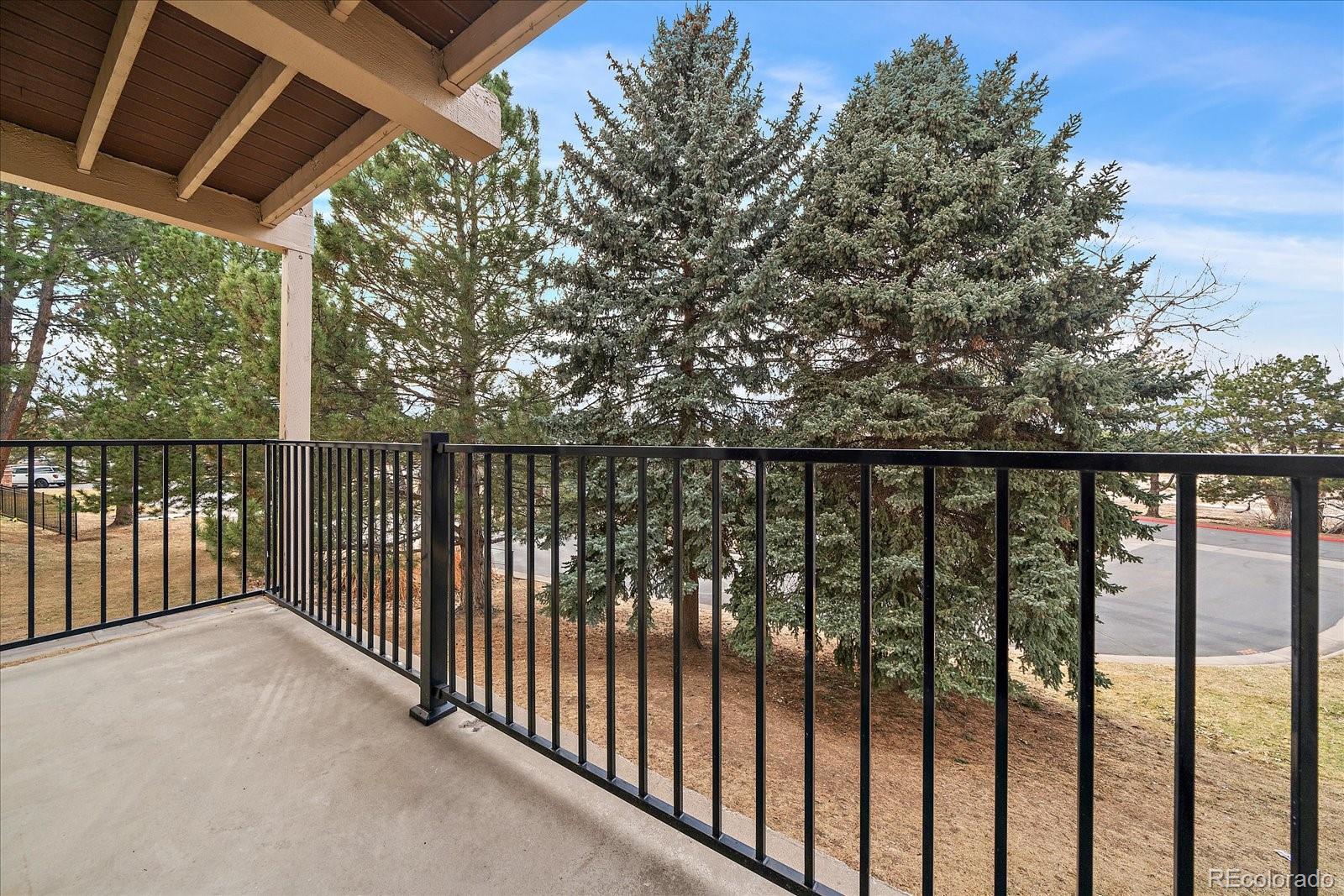 471 South Kalispell Way, Unit 101 Aurora, CO 80017 - Photo 20 of 27 a view of a street from a balcony