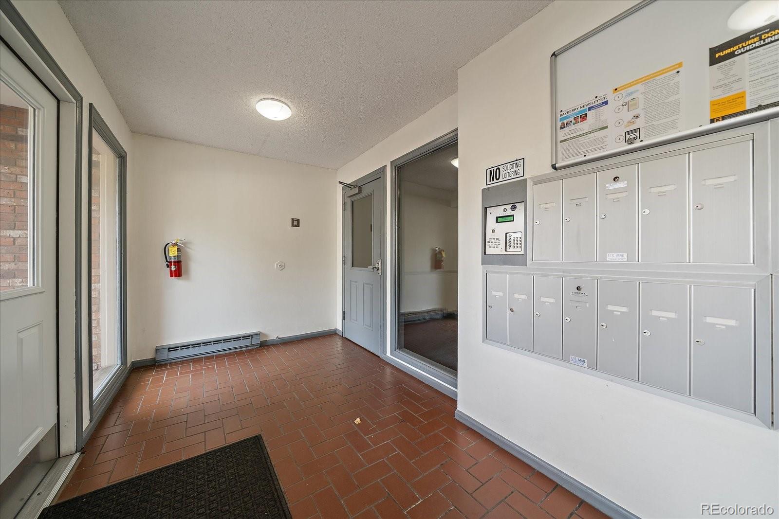 471 South Kalispell Way, Unit 101 Aurora, CO 80017 - Photo 2 of 27 wooden floor in an empty room