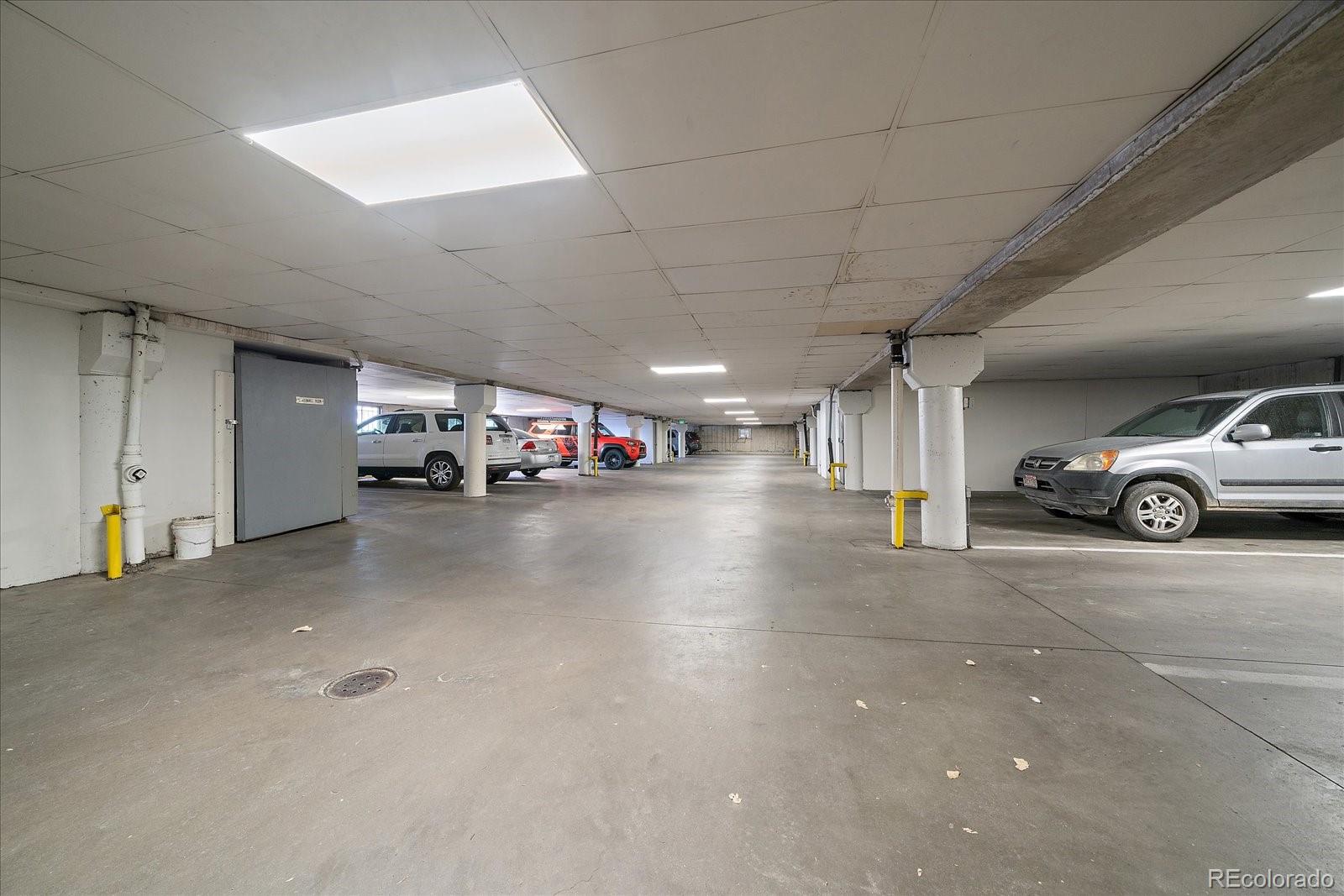471 South Kalispell Way, Unit 101 Aurora, CO 80017 - Photo 24 of 27 a view of parking area
