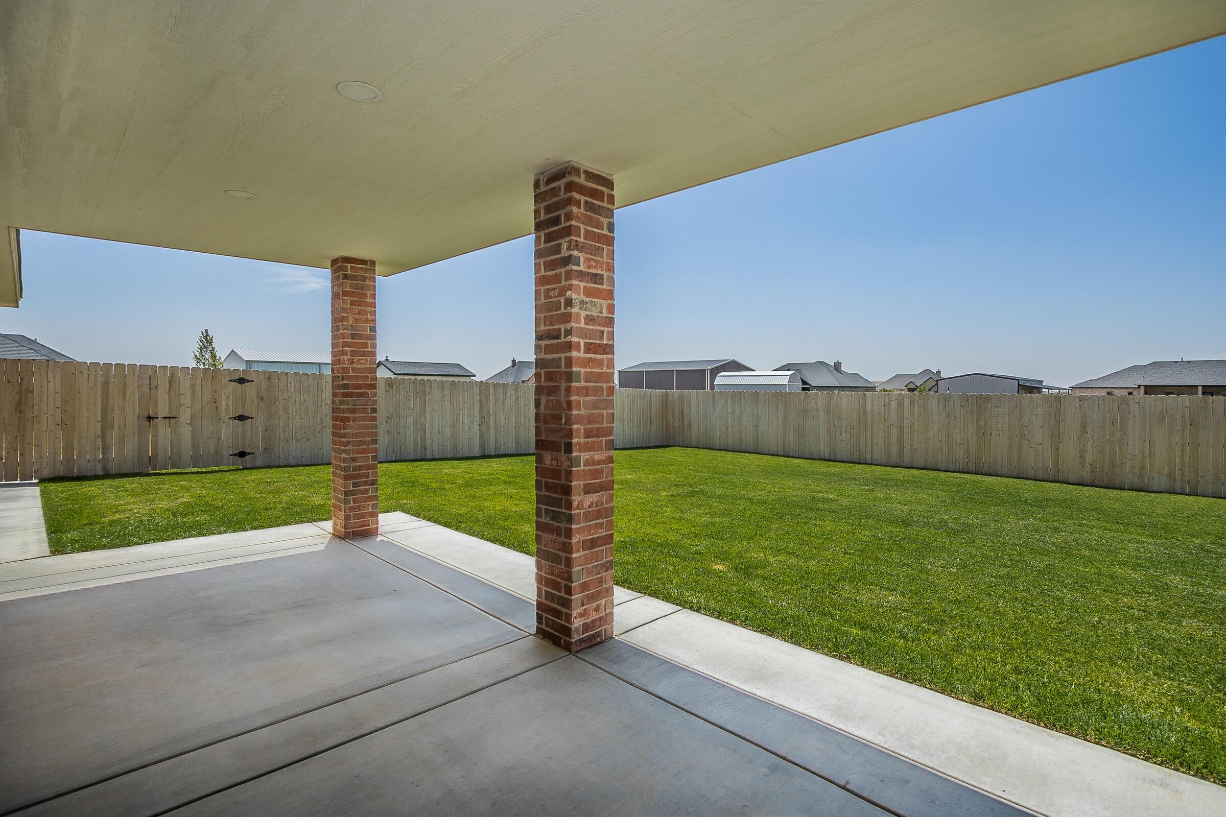 9289 Clinton Glen Road Amarillo, TX 79119 - Photo 23 of 27 a view of a back yard