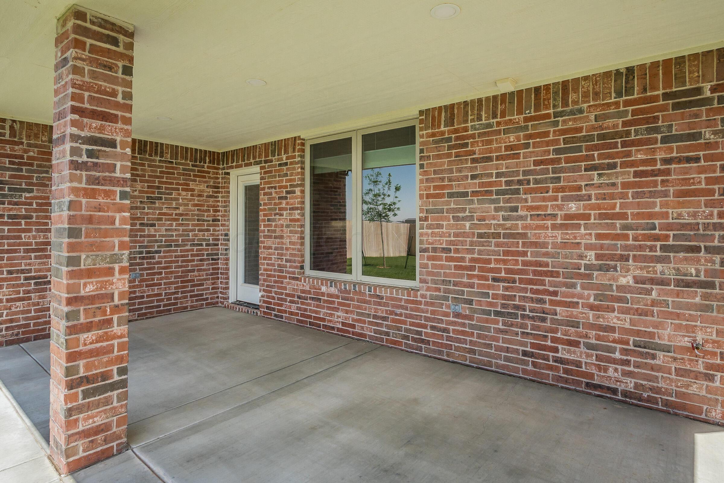 9289 Clinton Glen Road Amarillo, TX 79119 - Photo 26 of 27 a view of front door of house