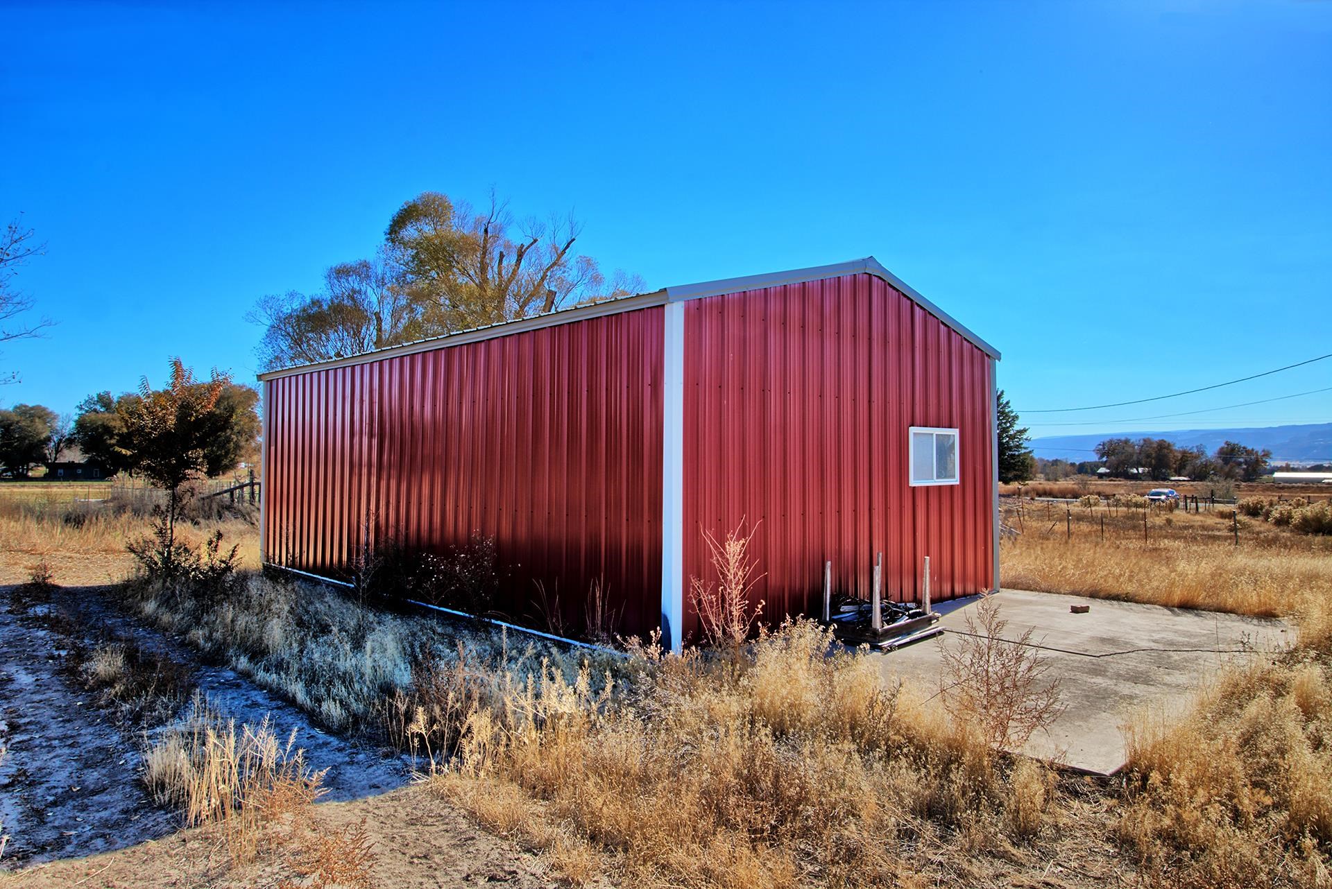 1688 M Road Fruita, CO 81521 - Photo 11 of 33 a view of a backyard
