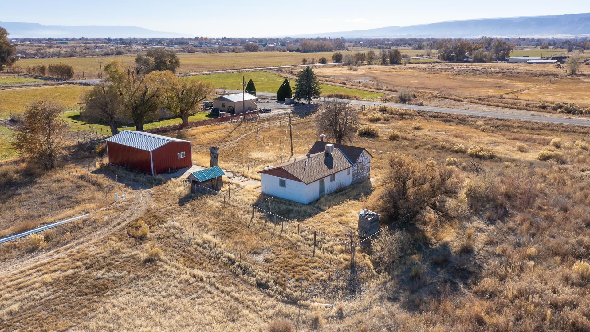 1688 M Road Fruita, CO 81521 - Photo 25 of 33 a view of a lake with couches and city view